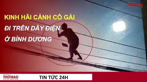 Kinh hãi cảnh cô gái đi trên dây điện ở Bình Dương