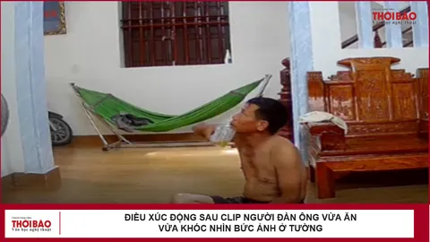 Điều xúc động sau clip người đàn ông vừa ăn vừa khóc nhìn bức ảnh ở tường